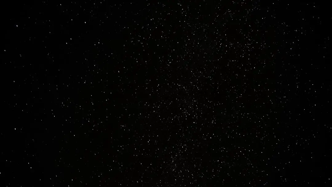a black sky with a lot of stars